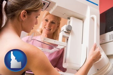 a nurse assisting a patient with a mammogram test - with Idaho icon