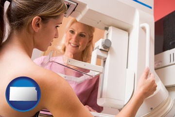 a nurse assisting a patient with a mammogram test - with Kansas icon